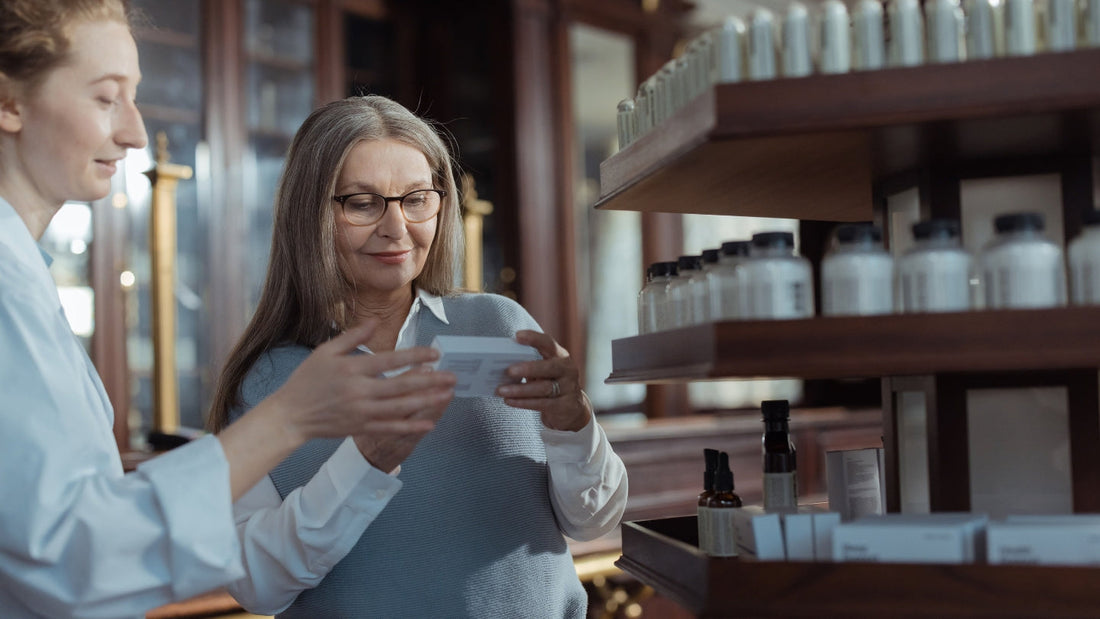 Woman discussing a supplement with a pharmacist